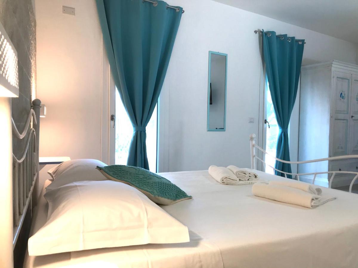 Angolo Mare Apartments & Rooms Porto Pino Exterior foto